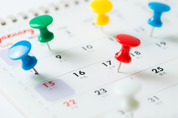 calendar with push pins