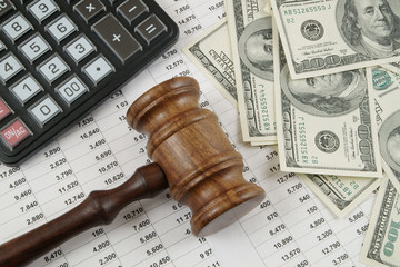 gavel calculator and money