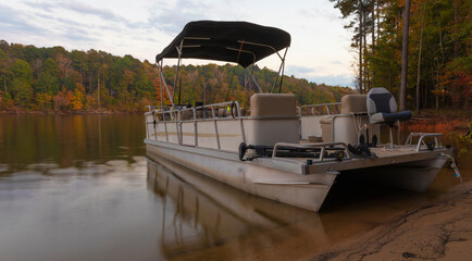 pontoon boat on lake