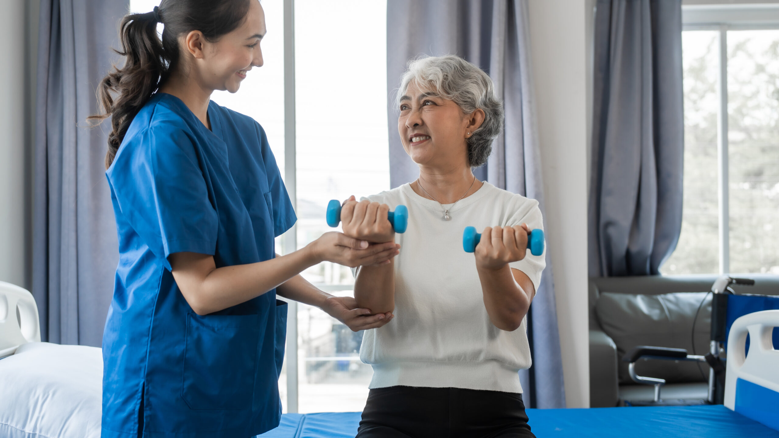 physical therapy woman with weights